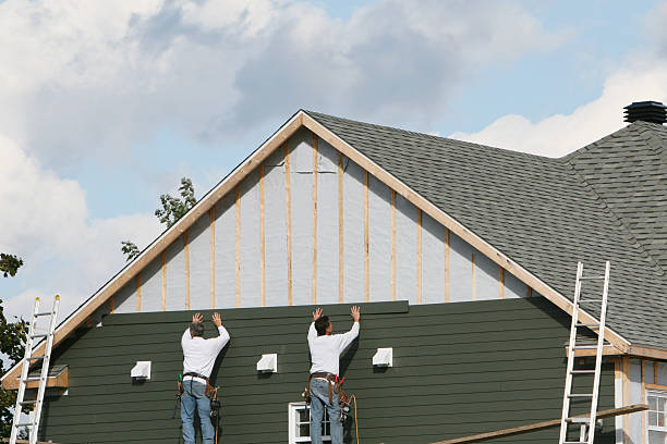 Professional Emergency Siding Repair technician working in Greenville, TX